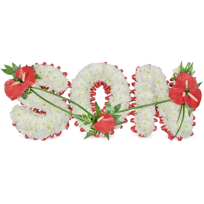 The image shows an elegant funeral tribute spelling out "SON" in large, freestanding floral letters, photographed against a plain white background that makes the colours and textures appear crisp and vivid. Each of the three letters is densely covered in petite white chrysanthemums, possibly spray varieties, arranged so closely that no gaps in the foliage can be seen. The petals form a soft yet structured surface, like a white quilt of flowers symbolising innocence, peace, and cherished memories. Running beneath the blooms and visible around the outer edges, a rich red ribbon or fabric is folded into scalloped pleats, tracing every curve and angle of the S, O, and N. This ribbon outlines each character with precision, adding definition and a strong colour contrast that gently echoes the depth of grief and enduring love a family might feel when saying goodbye. Three focal clusters of glossy red anthuriums, easily recognised by their waxy, heart-shaped spathes and pronounced spadices, add drama and significance. One generous cluster decorates the upper left arc of the S, accompanied by glossy deep green leaves and fine fern fronds. A smaller grouping is tucked at the base of the O, suggesting a tender, grounded farewell, while the most prominent cluster sits on the upper right of the N, its leaves and fronds framing the final letter like a protective embrace. Delicate green stems or leaf strands trail across the white chrysanthemums, visually connecting each red highlight. The overall effect is of a carefully thought-out memorial, the kind of personalised tribute often chosen for services in and around Sands End, whether at a local church, crematorium, or a quiet farewell near Imperial Wharf, to honour a beloved son with grace and heartfelt respect.